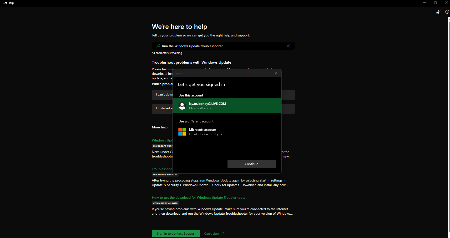 Screenshot of the "Get Help" Window that shows a search for "Run the Windows Update Troubleshooter" in the background with a Microsoft "Sign in" popup blocking the useful bits of it.